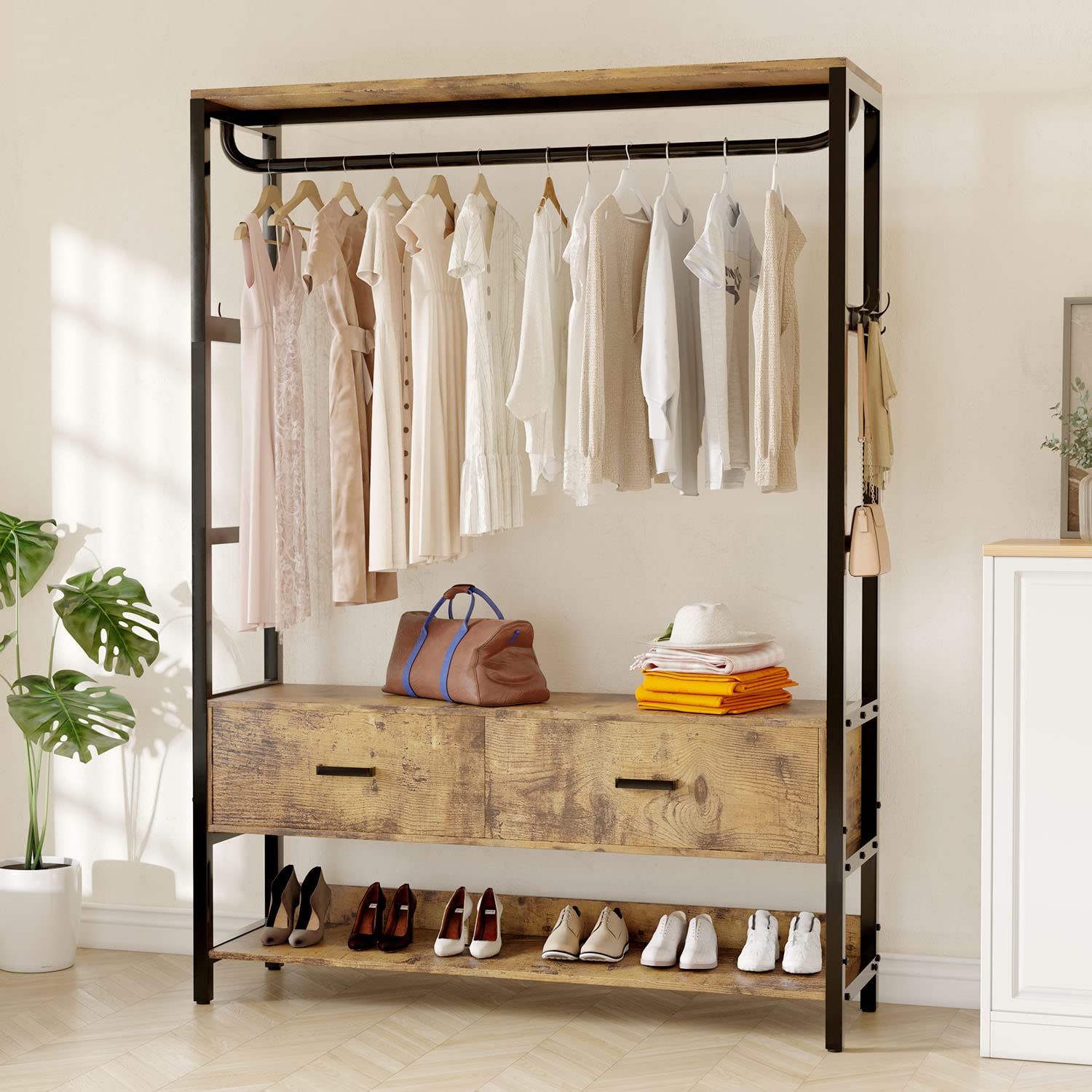 A wooden and metal freestanding closet organizer with hanging rods, shoe racks, and storage drawers, blending rustic and industrial styles.