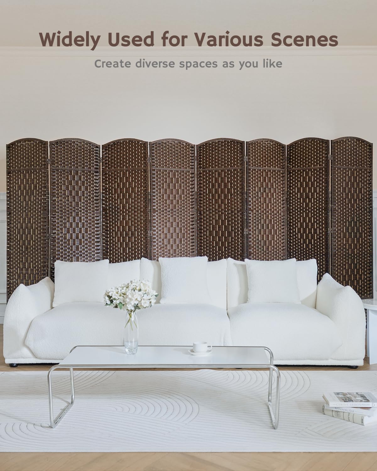 Dark brown bamboo 8-panel divider behind a white sofa in a bright living room, offering versatile space separation with a sleek, natural design.
