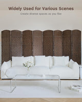 Dark brown bamboo 8-panel divider behind a white sofa in a bright living room, offering versatile space separation with a sleek, natural design.