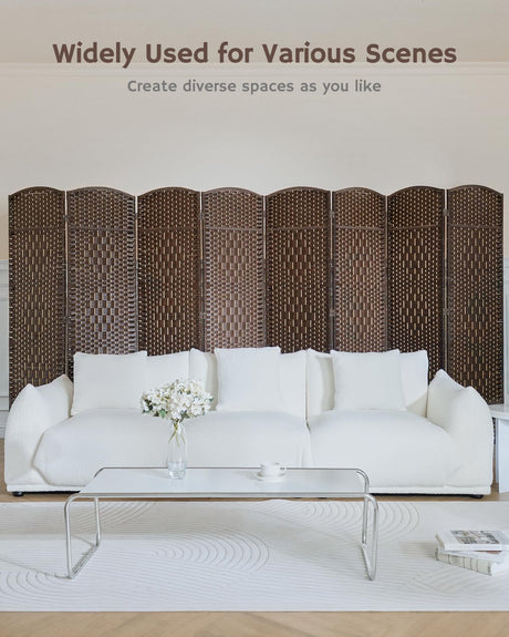 Dark brown bamboo 8-panel divider behind a white sofa in a bright living room, offering versatile space separation with a sleek, natural design.
