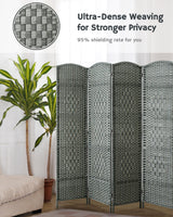 Dense woven grey bamboo divider near plants in a cozy living space, providing 95% privacy shielding with a natural, minimalist aesthetic.